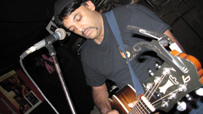  Ranj on guitar and at the mic... 